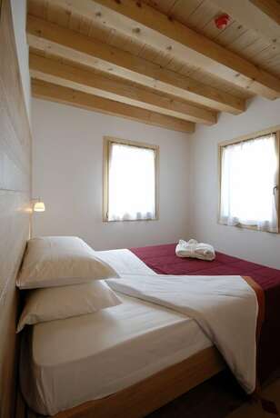 Imagen de la habitación del Hotel Borgo Ronchetto Relais Gourmet. Foto 18