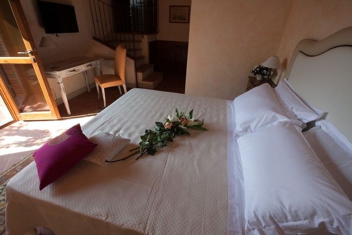 Imagen de la habitación del Hotel Borgo Sant'ambrogio Resort. Foto 16