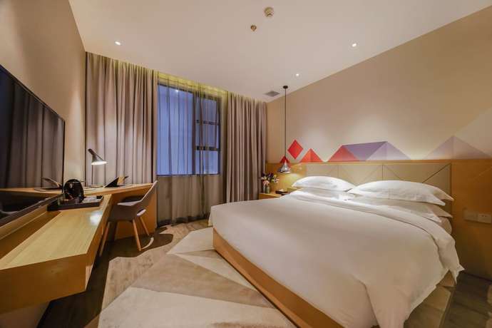 Imagen de la habitación del Hotel Borrman Canton Tower Kecun Station. Foto 5