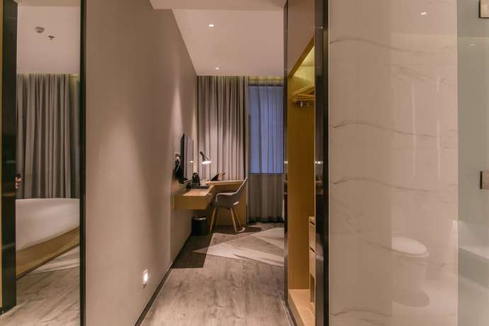 Imagen de la habitación del Hotel Borrman Canton Tower Kecun Station. Foto 11