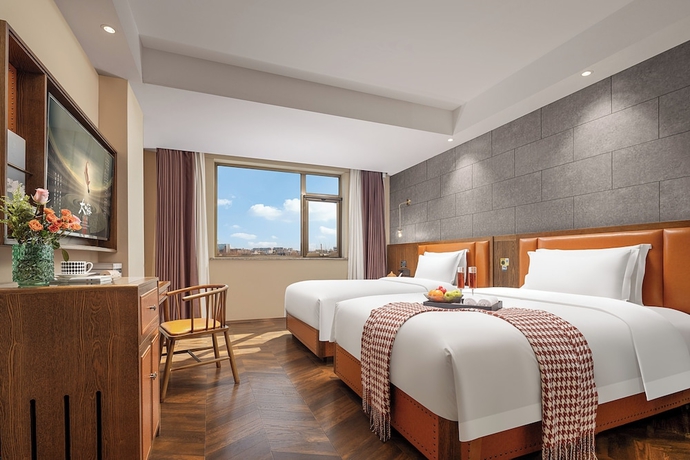 Imagen de la habitación del Hotel Borrman International Shunyi. Foto 4