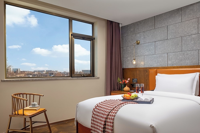 Imagen de la habitación del Hotel Borrman International Shunyi. Foto 5