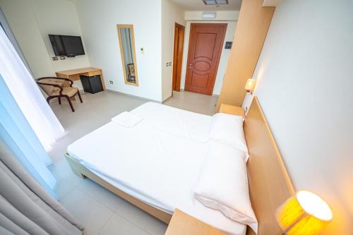 Imagen de la habitación del Hotel Borshi. Foto 16