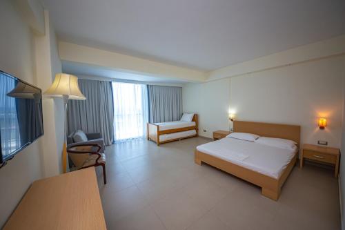 Imagen de la habitación del Hotel Borshi. Foto 17