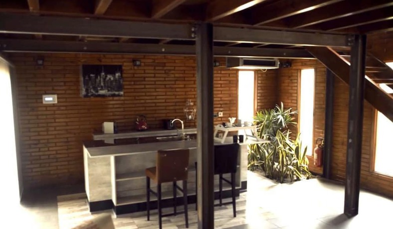 Imagen de la habitación del Hotel Boschetto Suites De Bosques. Foto 3