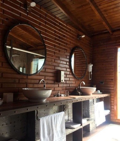 Imagen de la habitación del Hotel Boschetto Suites De Bosques. Foto 9