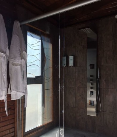 Imagen de la habitación del Hotel Boschetto Suites De Bosques. Foto 14