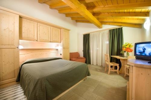 Imagen de la habitación del Hotel Boscone Suite. Foto 7