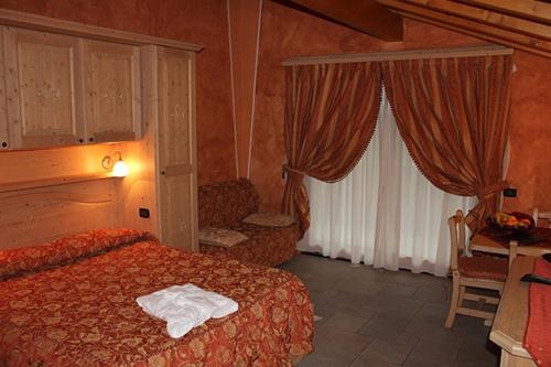 Imagen de la habitación del Hotel Boscone Suite. Foto 8