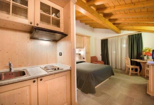 Imagen de la habitación del Hotel Boscone Suite. Foto 9