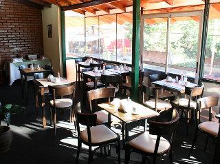 Imagen del bar/restaurante del Hotel Bosetti Apart Hotel. Foto 2