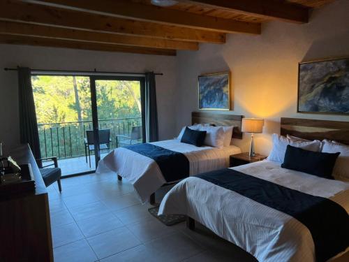 Imagen de la habitación del Hotel Bosque Escondido. Foto 17