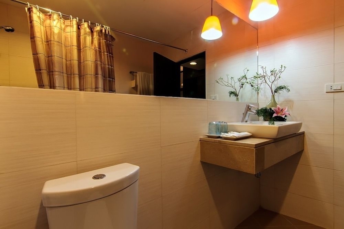 Imagen de la habitación del Hotel Bossotel Bangkok. Foto 5