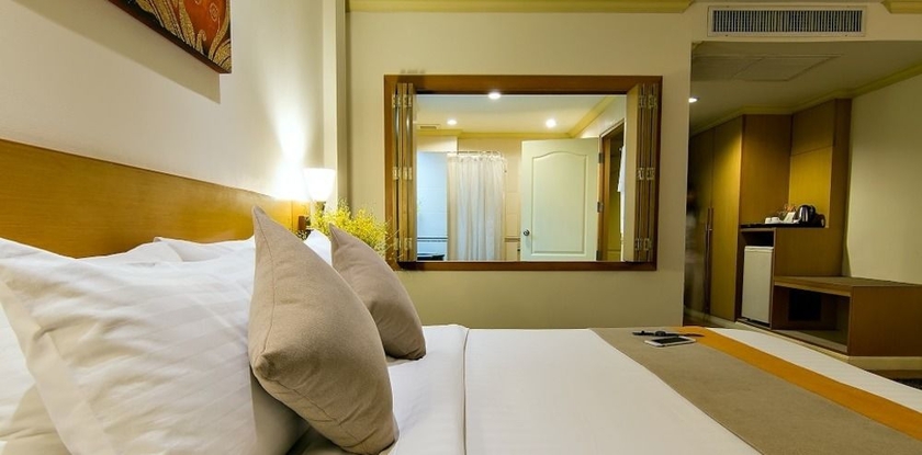 Imagen de la habitación del Hotel Bossotel Bangkok. Foto 6