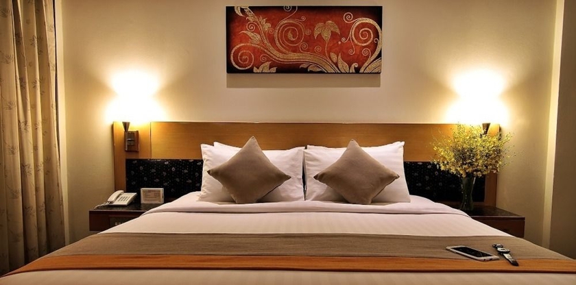 Imagen de la habitación del Hotel Bossotel Bangkok. Foto 9