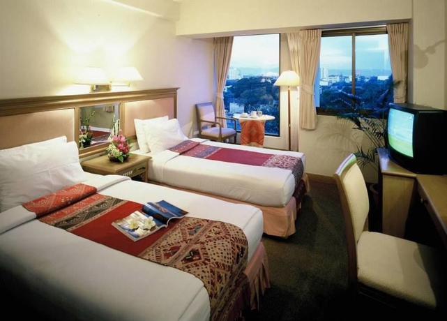 Imagen de la habitación del Hotel Bossotel Chiang Mai. Foto 3