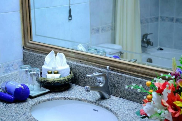 Imagen de la habitación del Hotel Bossotel Chiang Mai. Foto 6