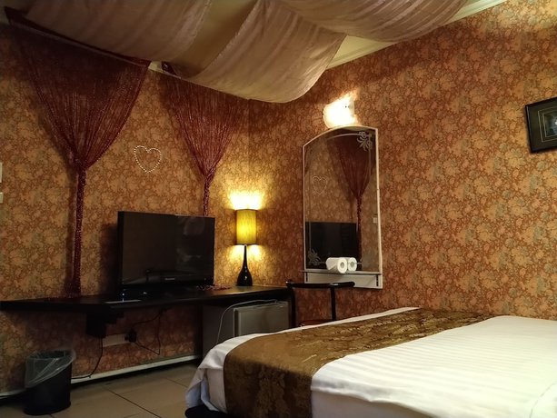 Imagen de la habitación del Hotel Boston, Chiayi City. Foto 2