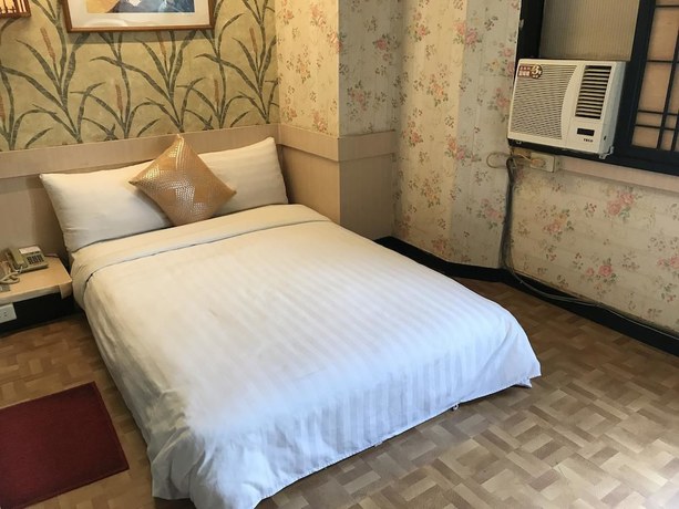Imagen de la habitación del Hotel Boston, Chiayi City. Foto 9