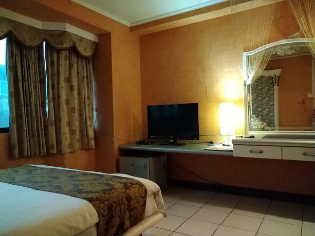Imagen de la habitación del Hotel Boston, Chiayi City. Foto 12