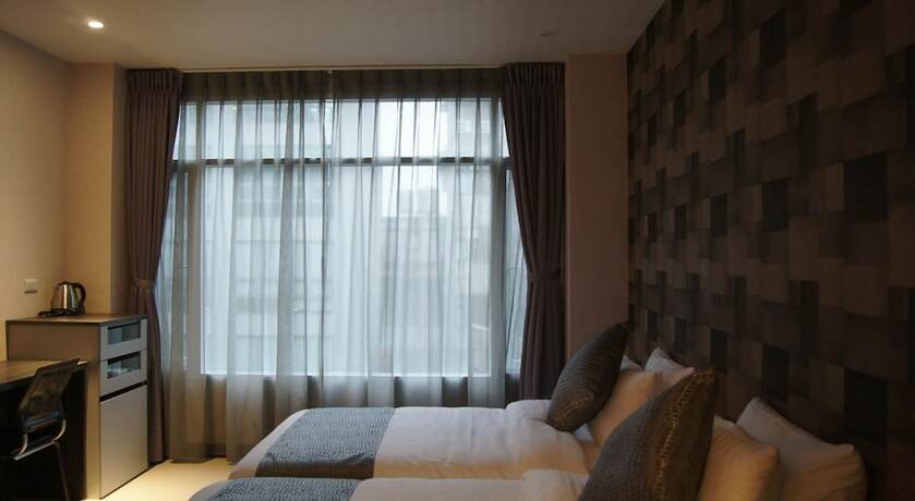 Imagen de la habitación del Hotel Boston Plus Hotel. Foto 15