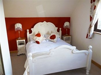 Imagen de la habitación del Hotel Bosvean House. Foto 8