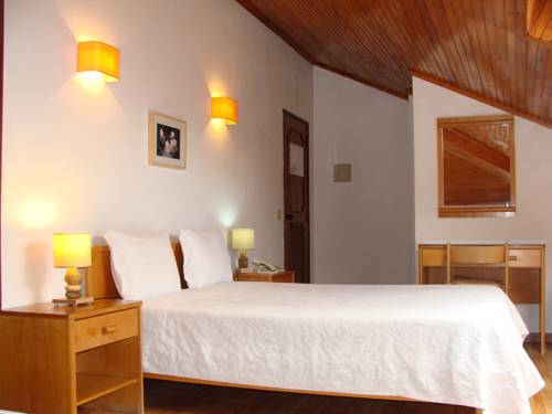 Imagen de la habitación del Hotel Botanico De Coimbra. Foto 7