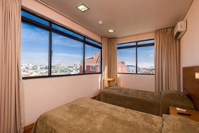Imagen de la habitación del Hotel Botanico, Lisboa. Foto 8