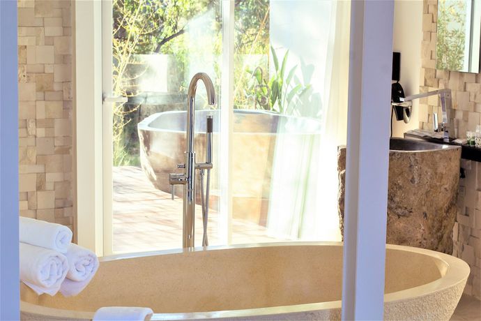 Imagen de la habitación del Hotel Botaniq Boutique. Foto 13