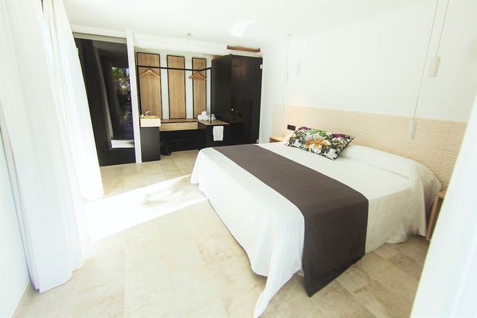 Imagen de la habitación del Hotel Botaniq Boutique. Foto 15