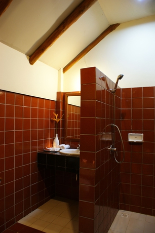 Imagen de la habitación del Hotel Botany Beach Resort. Foto 10