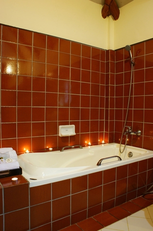 Imagen de la habitación del Hotel Botany Beach Resort. Foto 12