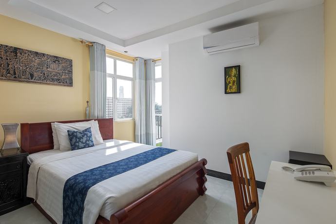 Imagen de la habitación del Hotel Botum Palace. Foto 17