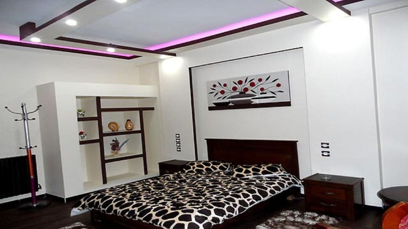 Imagen de la habitación del Hotel Bouazza. Foto 14