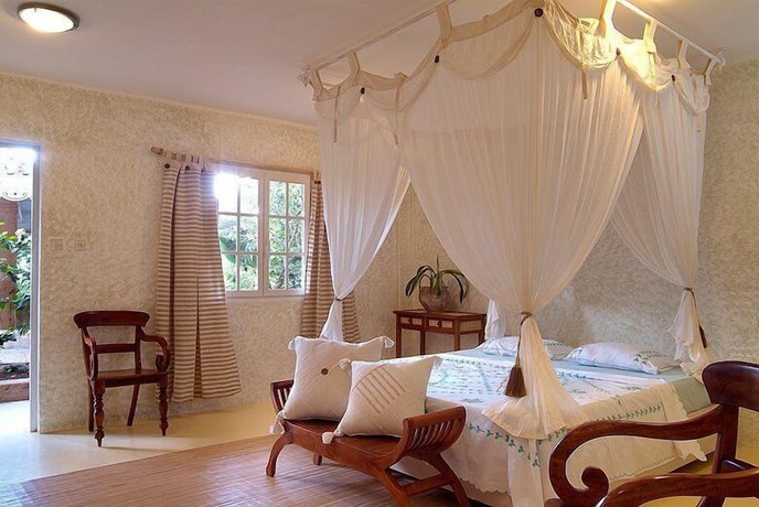 Imagen de la habitación del Hotel Bougainvilla. Foto 8