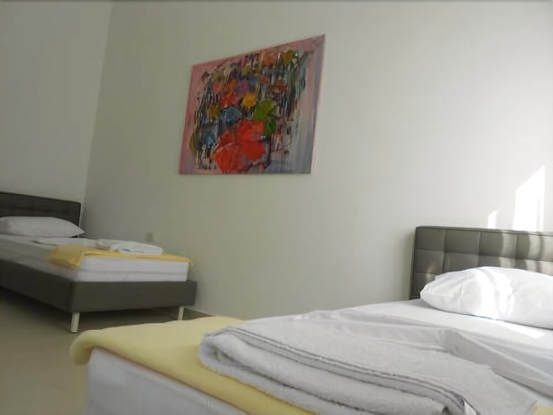 Imagen de la habitación del Hotel Bougainville Bay Serviced Apartments. Foto 8