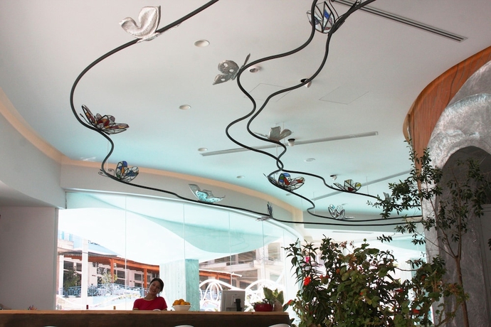 Imagen del bar/restaurante del Hotel Bougainville Bay Serviced Apartments. Foto 2