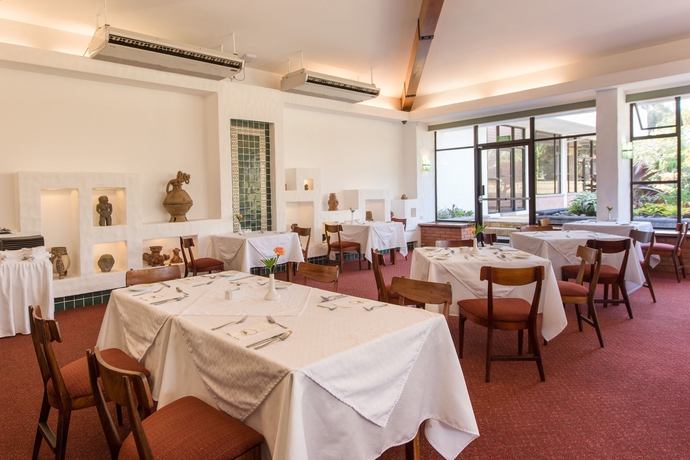 Imagen del bar/restaurante del Hotel Bougainvillea San José. Foto 14