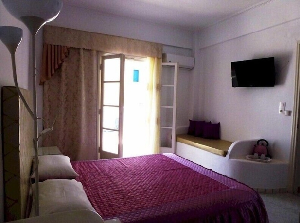Imagen de la habitación del Hotel Bougainvillea Suites. Foto 7