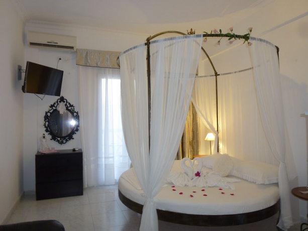 Imagen de la habitación del Hotel Bougainvillea Suites. Foto 8
