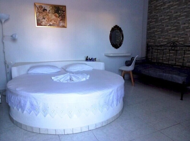Imagen de la habitación del Hotel Bougainvillea Suites. Foto 10