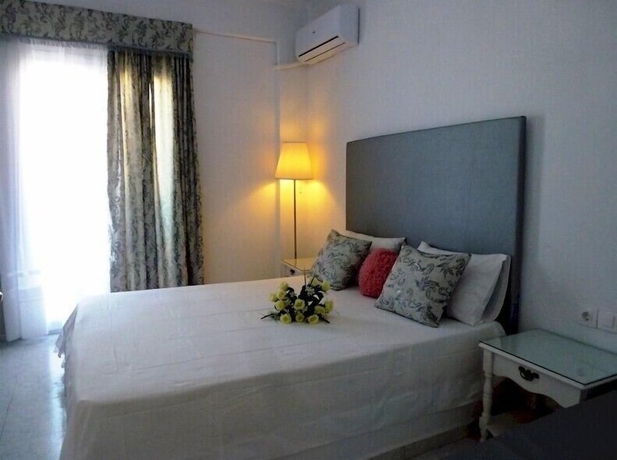 Imagen de la habitación del Hotel Bougainvillea Suites. Foto 13