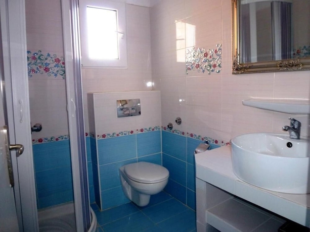 Imagen de la habitación del Hotel Bougainvillea Suites. Foto 17