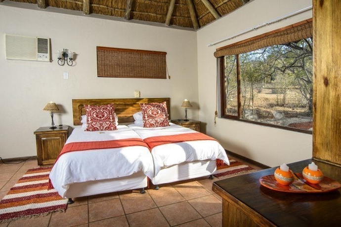 Imagen de la habitación del Hotel Boulders Safari Lodge. Foto 11