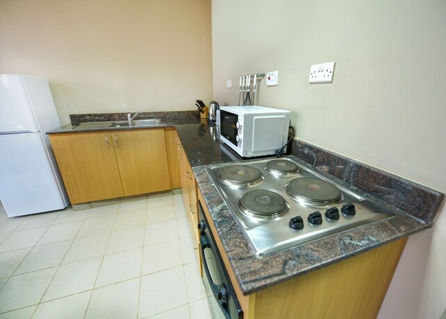 Imagen de la habitación del Hotel Boulevard Suites, Kampala. Foto 19