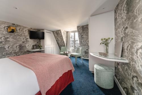 Imagen de la habitación del Hotel Bourgogne Et Montana. Foto 15