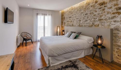 Imagen de la habitación del Hotel Boutique Abadia del Maestrat. Foto 18