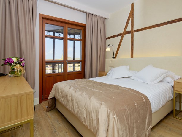 Imagen de la habitación del Hotel Boutique Adolfo. Foto 6