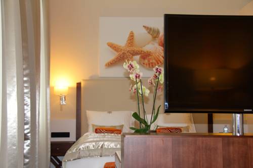 Imagen de la habitación del Hotel Boutique Adria. Foto 16