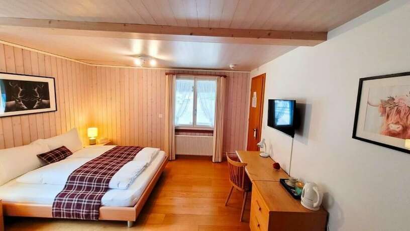 Imagen de la habitación del Hotel Boutique Alpina. Foto 17
